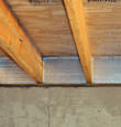 SilverGlo™ insulation installed in a floor joist in Versailles