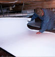 Shelbyville insulation being installed in a crawl space.