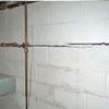 Severe foundation damage from a long crack in a bucking wall of a Harrodsburg home.