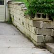 a collapsing retaining wall in Berea