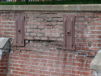 A collapsing, crumbling retaining wall in Waynesburg