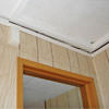 The ceiling and wall separating as the wall sinks with the slab floor in a Corbin home