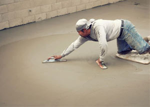 smoothing out the grout in a slab releveling project in Shelbyville