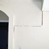 partition walls being pulled away from the foundation walls in a London home.