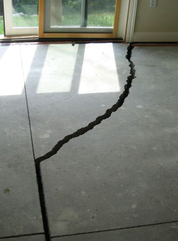 severely cracked foundation slab floor in Pine Knot