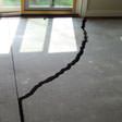 a huge crack in a concrete slab floor in Georgetown