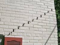Stair-step cracks showing in a home foundation in Lebanon