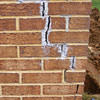 Tuckpointing that cracked due to foundation settlement of a Richmond home