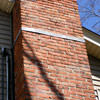 A tilting chimney on a Waynesburg home with a leaning, tilting chimney that was temporarily repaired.