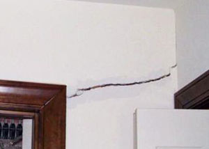 A large drywall crack in an interior wall in Danville