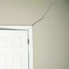 A long drywall crack beginning at the corner of a doorway in a Cynthiana home.