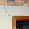 A large settlement crack on interior drywall in a London home.