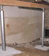 A system of crawl space support posts adding structural support to a crawl space in Pine Knot