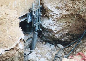 a bent, failed foundation push pier installed in Georgetown.