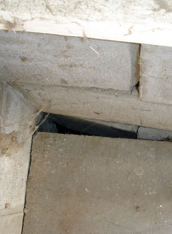 inward rotation of a foundation wall damaged by street creep in a garage in Hazard