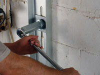 Mounting a foundation wall channel anchor in Shelbyville.