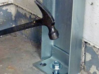 Mounting a foundation channel anchor installation to the floor in Shelbyville.