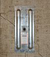 A fully exposed wall anchor plate installed along a Stearns foundation wall