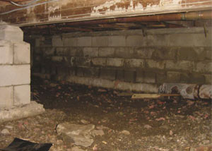 Rotting, decaying crawl space wood damaged over time in East Bernstadt