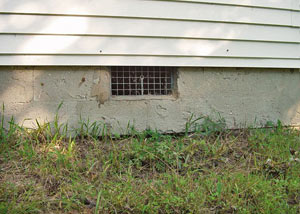 Open crawl space vents that let rodents, termites, and other pests in a home in Lawrenceburg