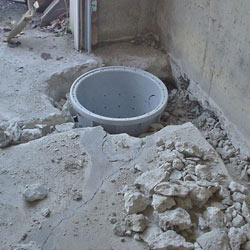 Placing a sump pit in a Mc Kee home