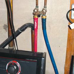 Washer hoses in a basement  in Waynesburg