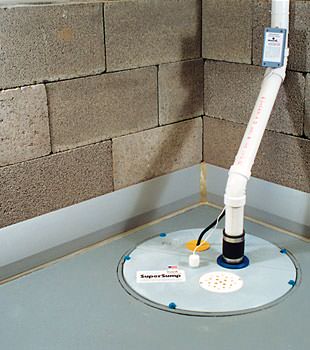 A baseboard basement drain pipe system installed in Campbellsville
