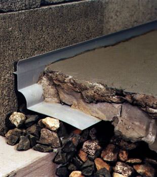 a custom designed basement drain system for thin basement floors in Hazard.