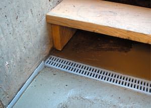 a hatchway entrance in Cynthiana that has been protected from flooding by our TrenchDrain basement drainage system.
