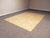 Tiled and carpeted basement flooring options for basement floor finishing in Nicholasville