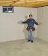 Shelbyville basement insulation covered by EverLast™ wall paneling, with SilverGlo™ insulation underneath
