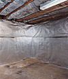 An energy efficient radiant heat and vapor barrier for a Pine Knot basement finishing project